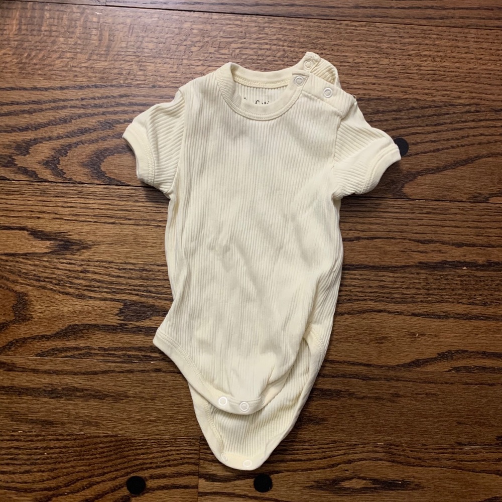 Fin and Vince pale yellow onesie